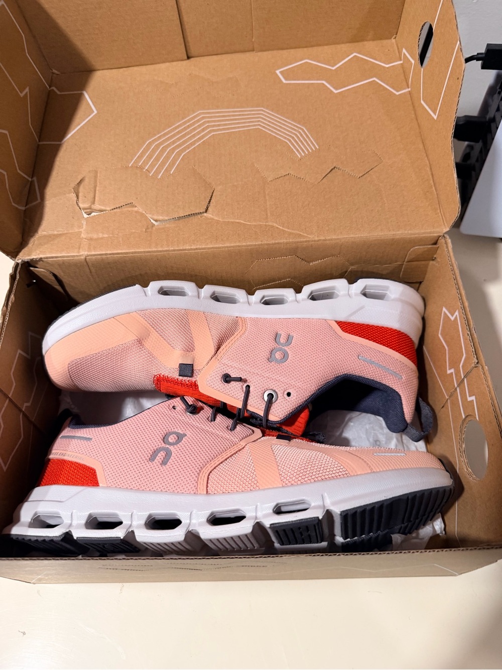 On Pink and Red Lightweight Athletic Sneakers